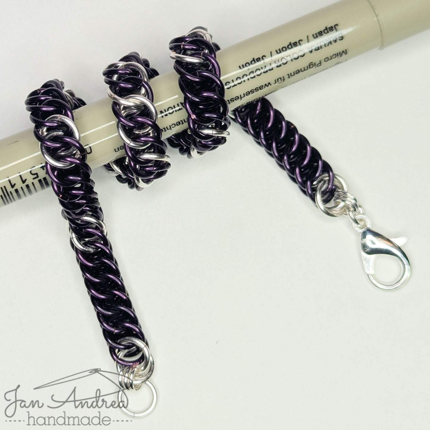 Bracelet wrapped around a Micron pen