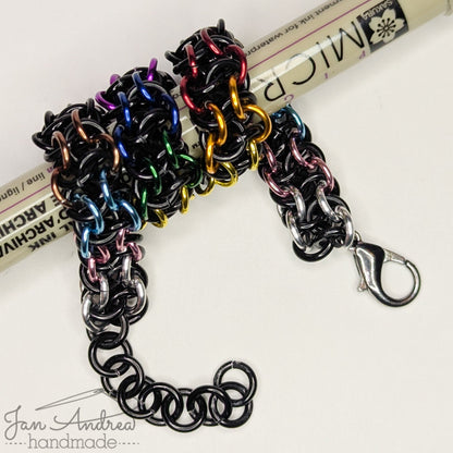 Bracelet wrapped around a Micron pen