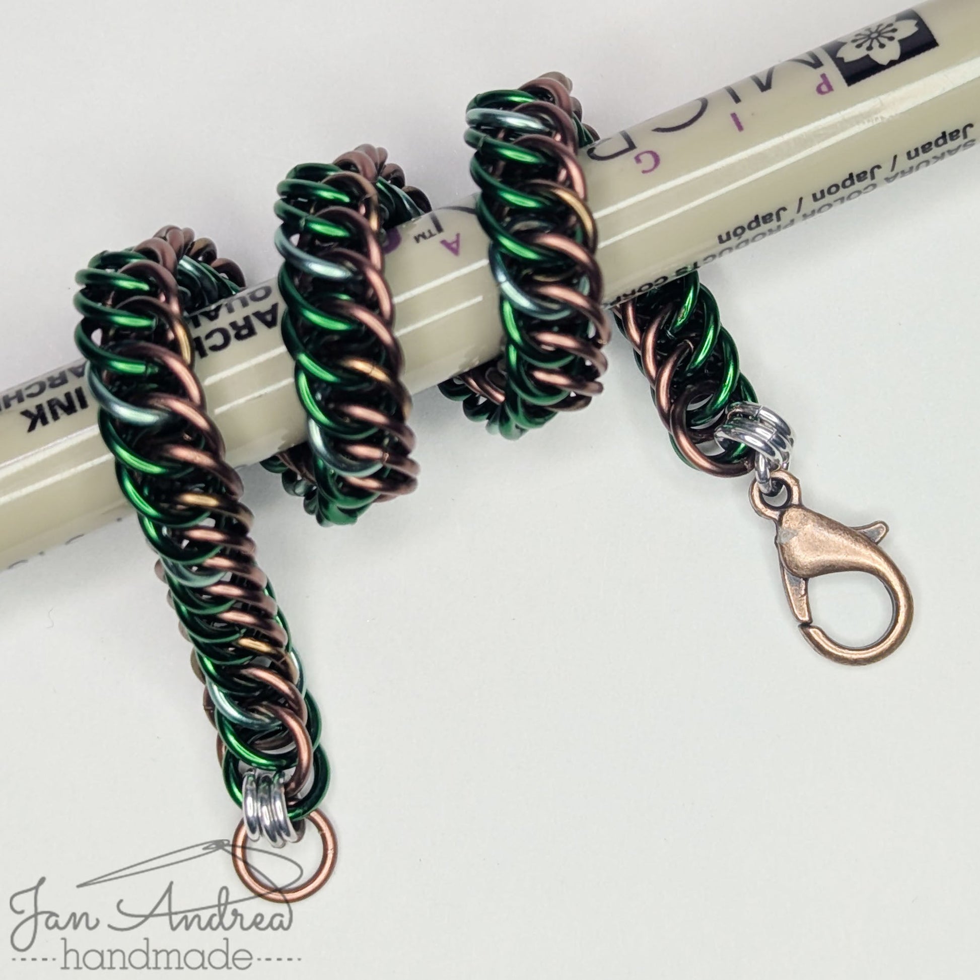 Bracelet wrapped around a Micron pen